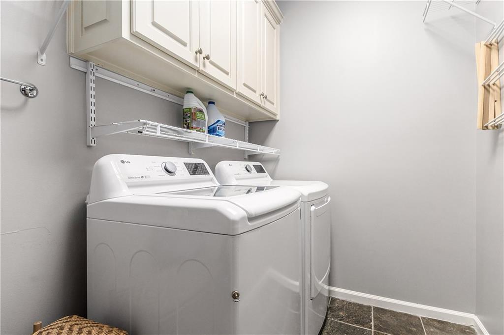 280 Sutherland Place Northeast Atlanta, GA 30307 - Photo 33 of 66 a utility room with dryer and washer
