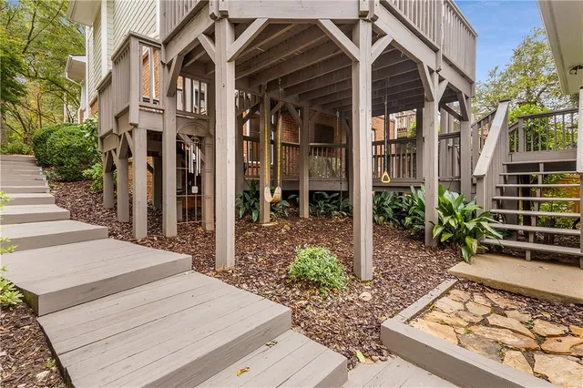 a view of a livingroom with furniture and a window