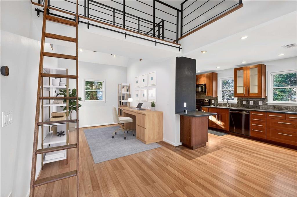 280 Sutherland Place Northeast Atlanta, GA 30307 - Photo 47 of 66 a kitchen with a refrigerator and wooden floor