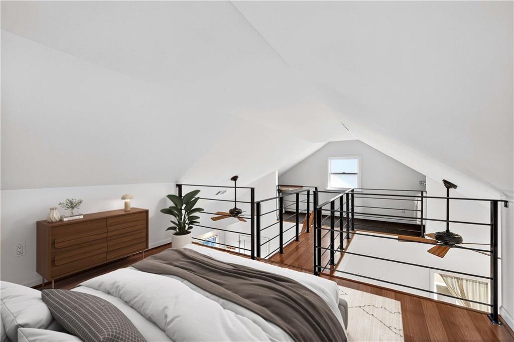 280 Sutherland Place Northeast Atlanta, GA 30307 - Photo 52 of 66 a bedroom with furniture and a chandelier