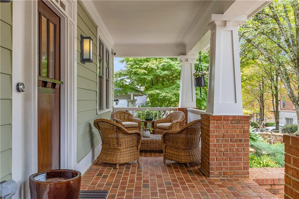 280 Sutherland Place Northeast Atlanta, GA 30307 - Photo 6 of 66 a balcony view with couple of chairs and a window