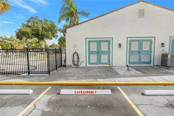 a view of a swimming pool with a backyard