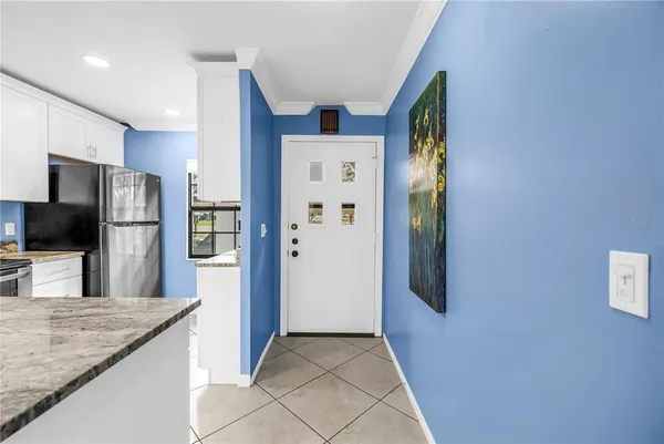 a view of a kitchen cabinets and a kitchen