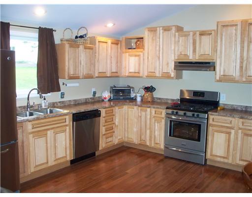 135-145 Laurel Run Road Waynesburg, PA 15370 - Photo 3 of 10 Kitchen. Kitchen in House #147, beautiful cabinetry and pretty hardwood floors!