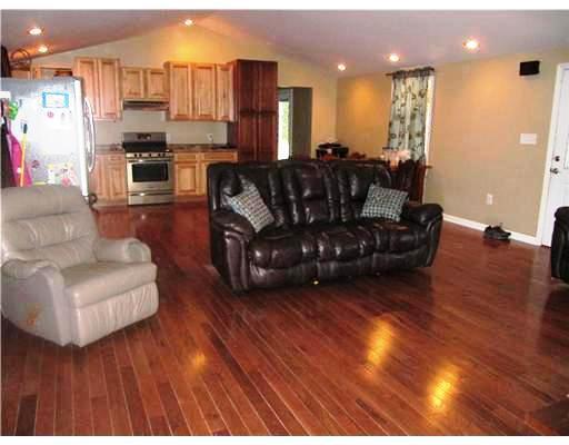 135-145 Laurel Run Road Waynesburg, PA 15370 - Photo 4 of 10 Living Room. Living Room in house #147, notice open living space and vaulted ceilings with can lights and hardwood floors - LOVELY!