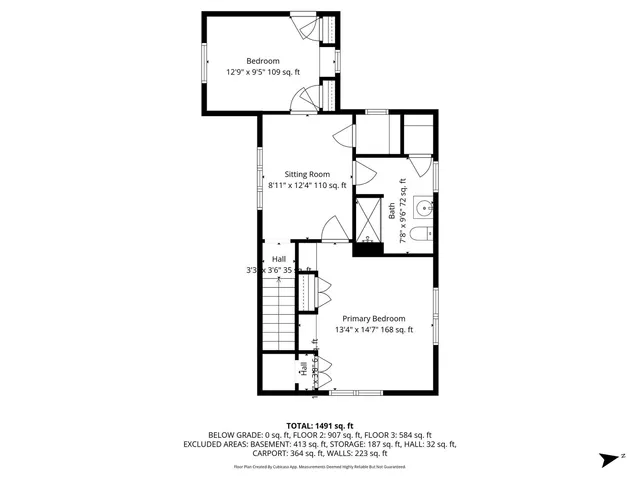 a picture of a bench in front of a building