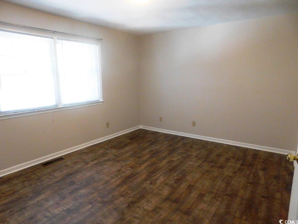 1025 Carolina Road, Unit FF3 Conway, SC 29526 - Photo 11 of 16 Bedroom with dark wood-type flooring