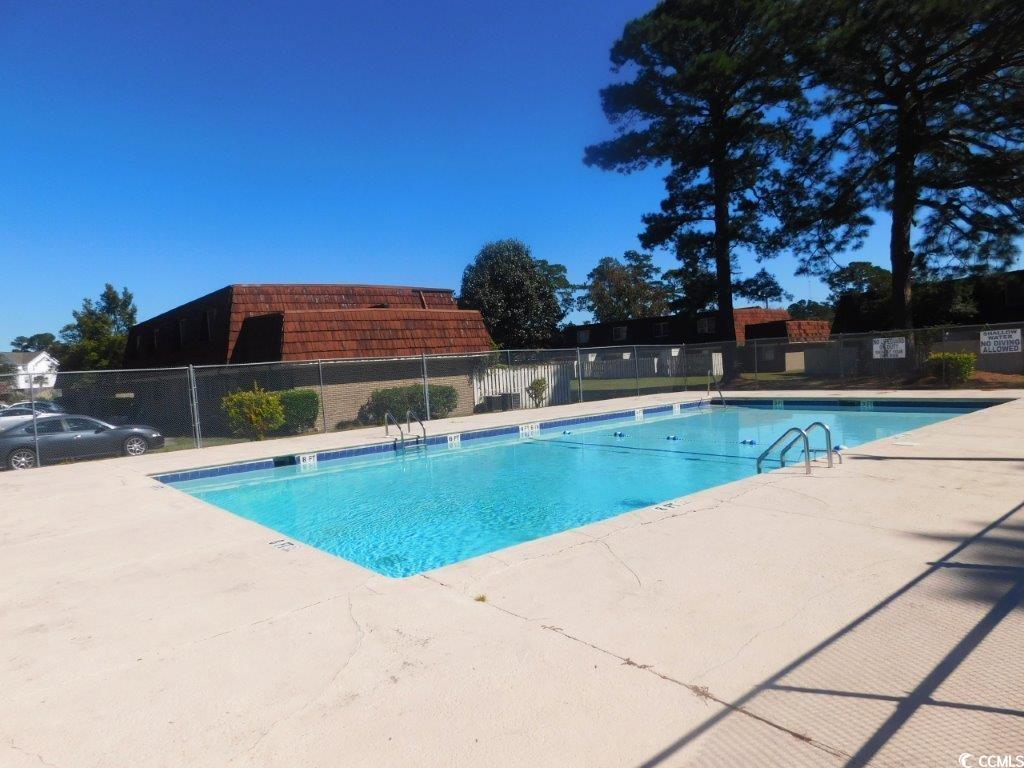 1025 Carolina Road, Unit FF3 Conway, SC 29526 - Photo 16 of 16 View of swimming pool featuring a patio area
