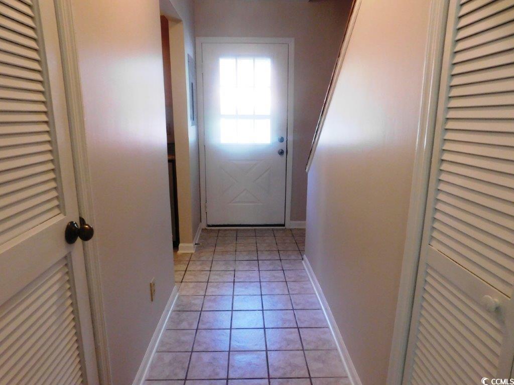 1025 Carolina Road, Unit FF3 Conway, SC 29526 - Photo 2 of 16 Doorway to outside with light tile patterned floor