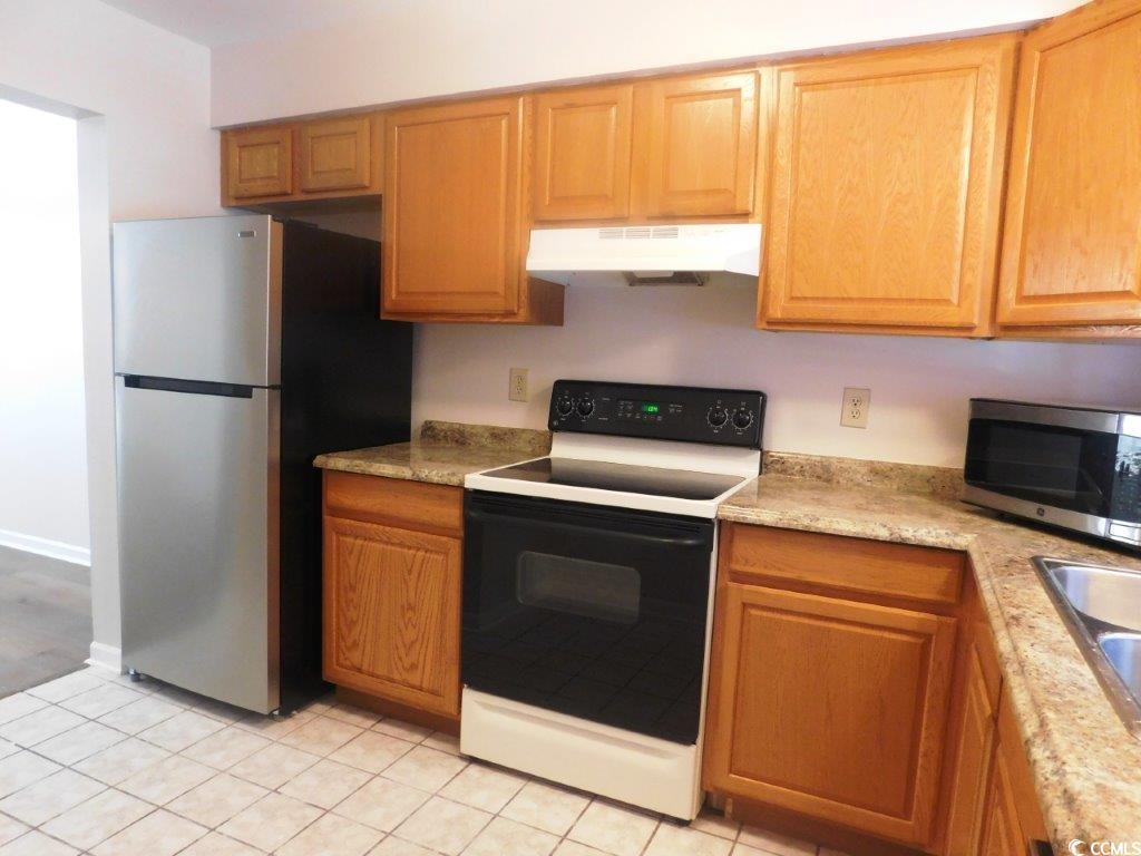1025 Carolina Road, Unit FF3 Conway, SC 29526 - Photo 7 of 16 Kitchen featuring stainless steel appliances and l