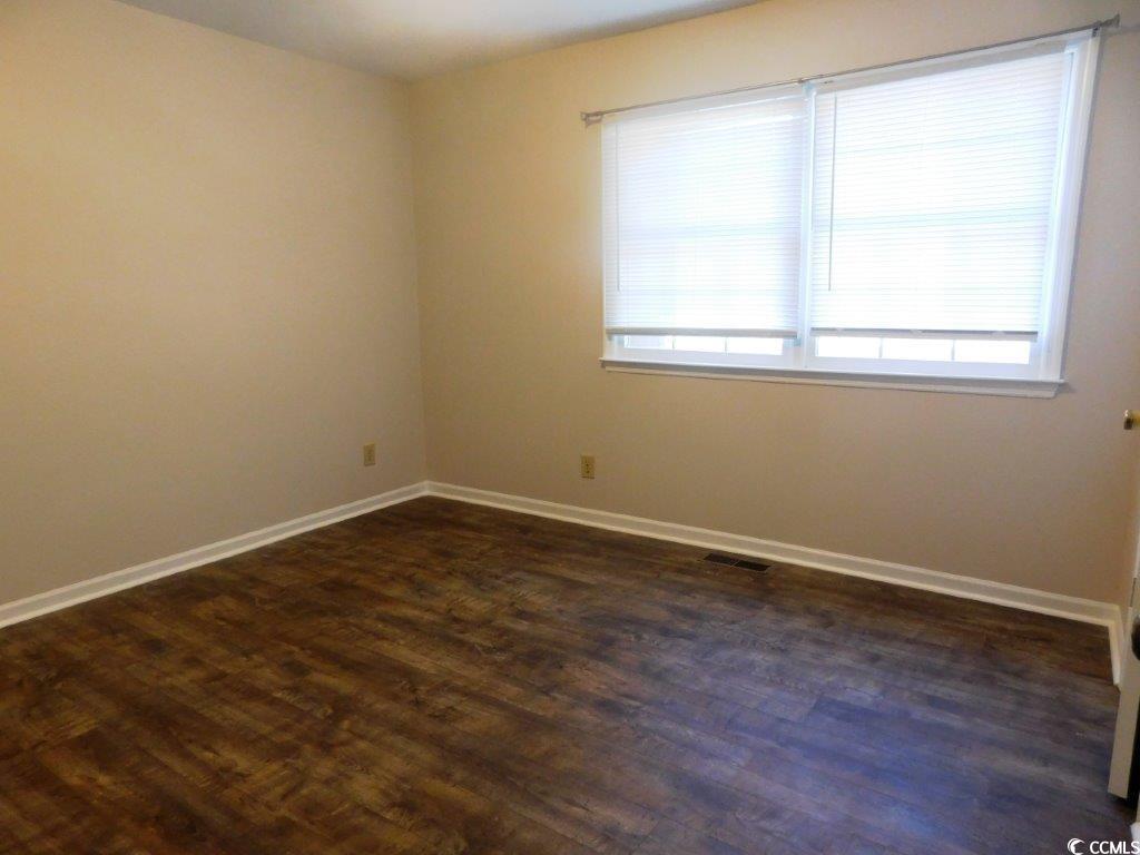 1025 Carolina Road, Unit FF3 Conway, SC 29526 - Photo 10 of 16 Spare room with plenty of natural light and dark h