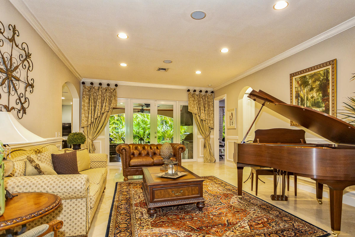 1301 Southwest 16th Street Boca Raton, FL 33486 - Photo 11 of 57 a living room with furniture and a wooden floor