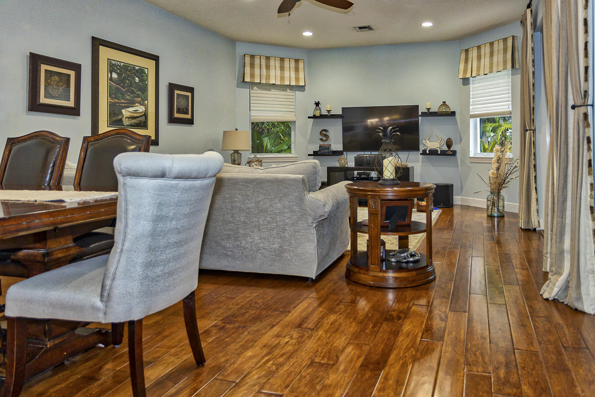1301 Southwest 16th Street Boca Raton, FL 33486 - Photo 12 of 57 a living room with furniture and a wooden floor