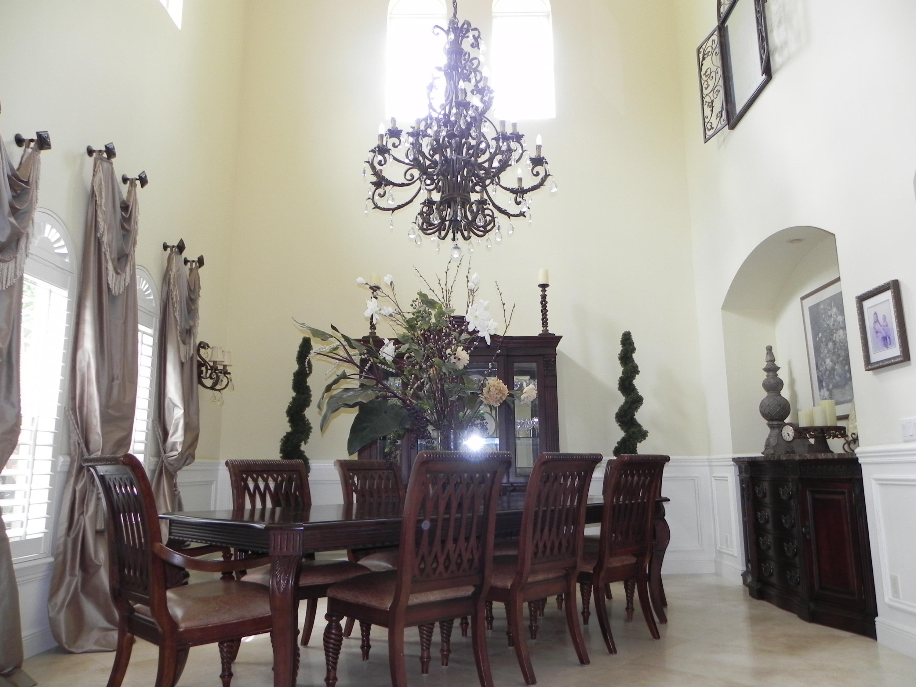 1301 Southwest 16th Street Boca Raton, FL 33486 - Photo 16 of 57 a view of a dining room with furniture and chandelier