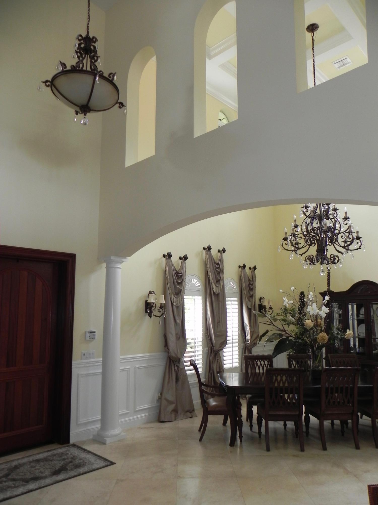 1301 Southwest 16th Street Boca Raton, FL 33486 - Photo 20 of 57 a view of a dining room with furniture and chandelier
