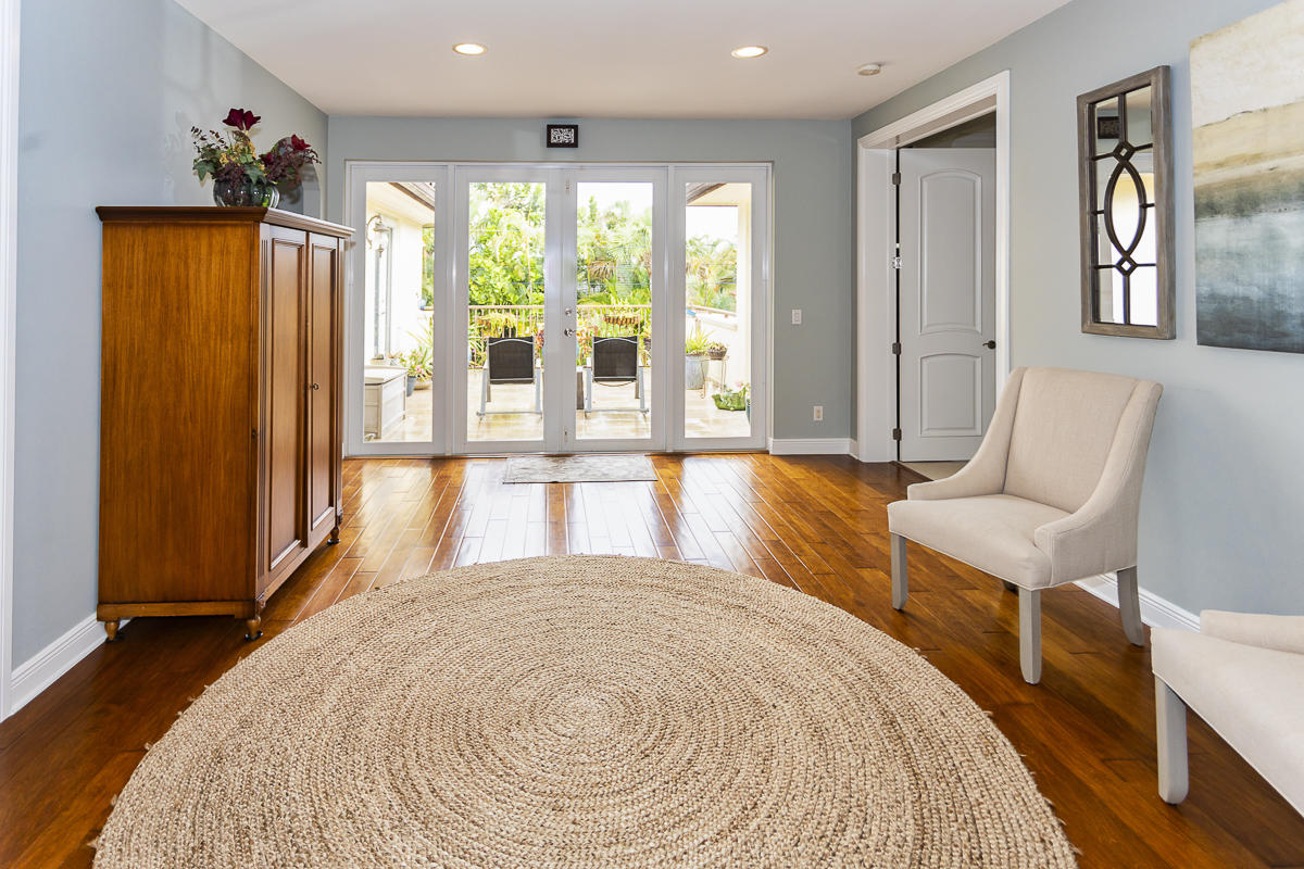 1301 Southwest 16th Street Boca Raton, FL 33486 - Photo 28 of 57 a spacious bedroom with a large bed and a large window