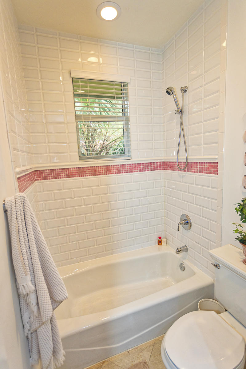 1301 Southwest 16th Street Boca Raton, FL 33486 - Photo 32 of 57 a bathroom with a toilet and a bathtub