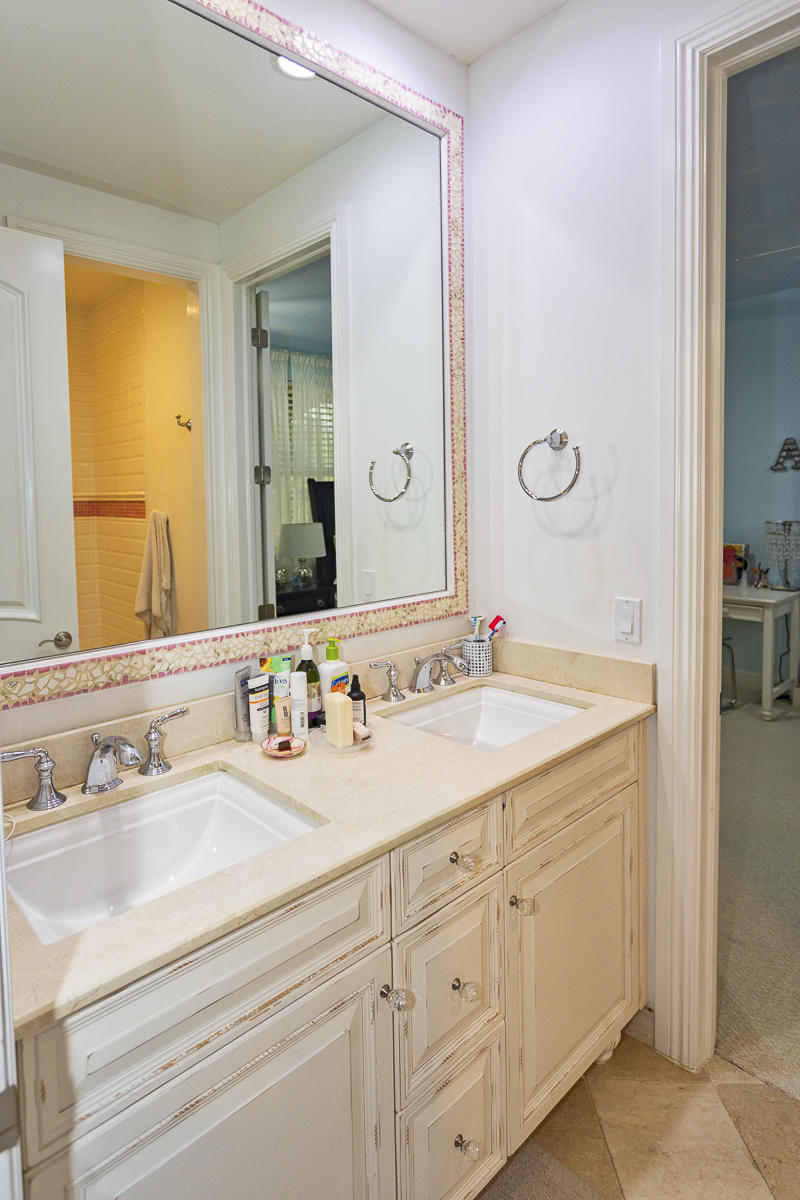 1301 Southwest 16th Street Boca Raton, FL 33486 - Photo 33 of 57 a bathroom with a sink and a mirror