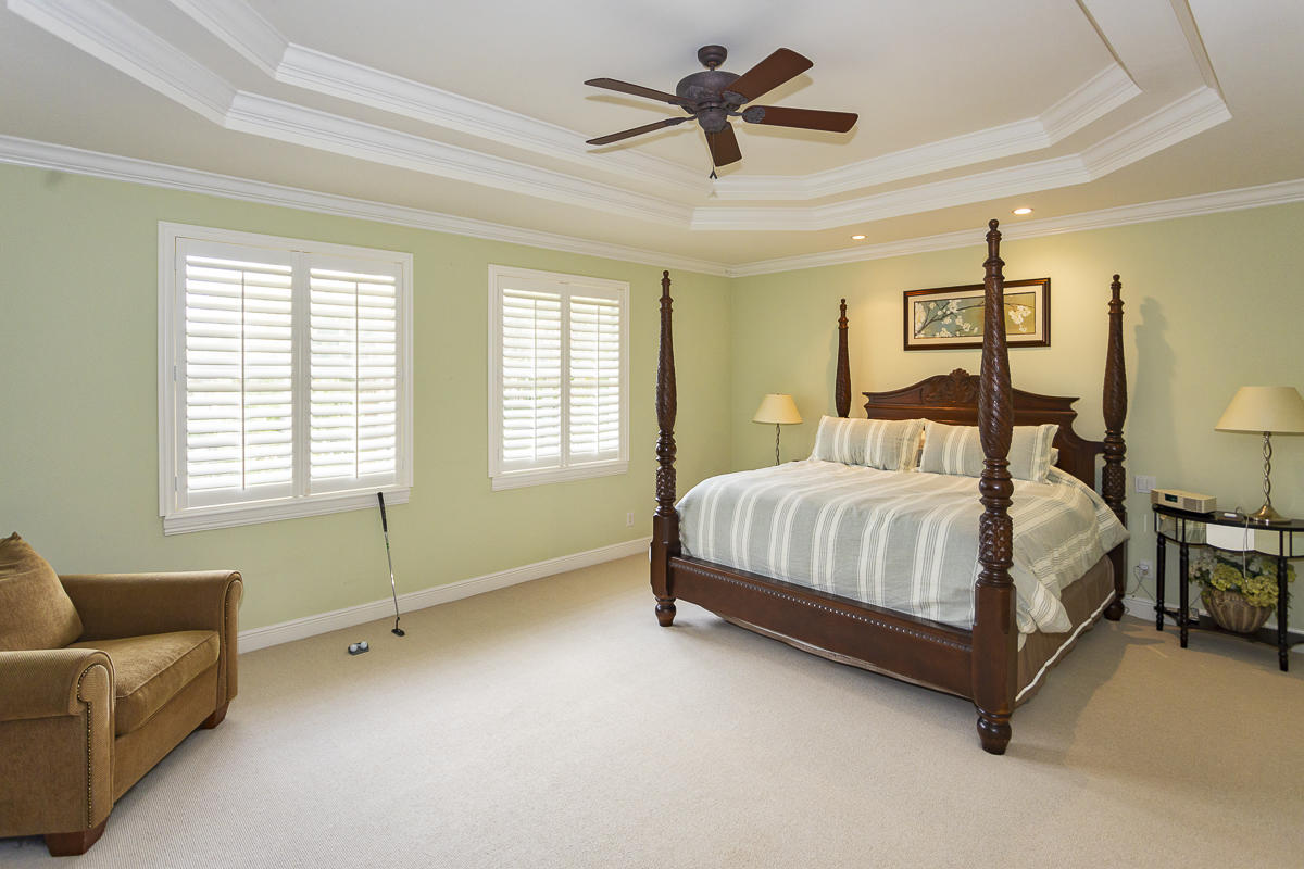 1301 Southwest 16th Street Boca Raton, FL 33486 - Photo 37 of 57 a bedroom with a bed couch and window