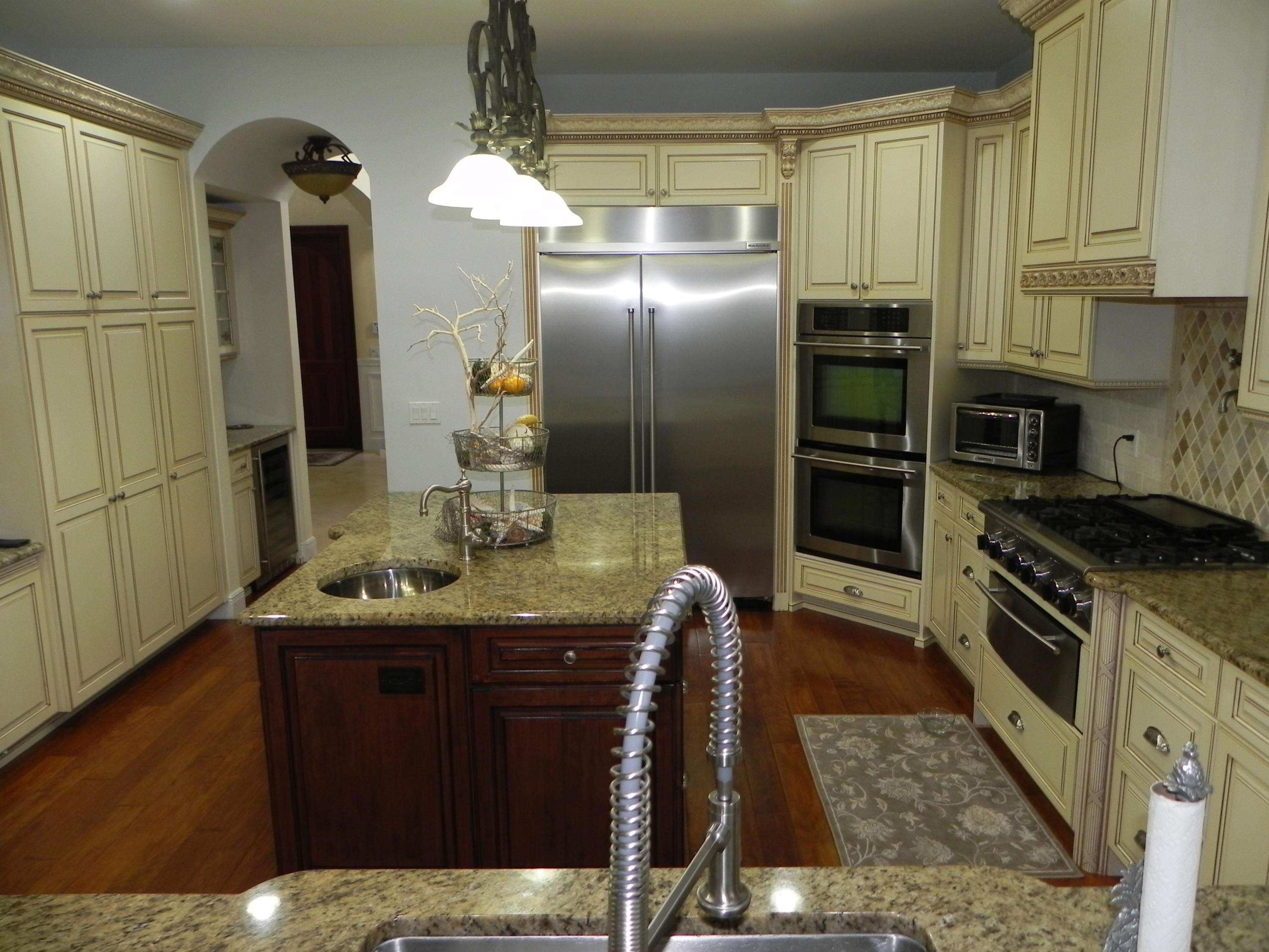 1301 Southwest 16th Street Boca Raton, FL 33486 - Photo 7 of 57 a kitchen with stainless steel appliances granite countertop a stove a sink and a refrigerator