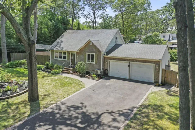 a house with trees in the background