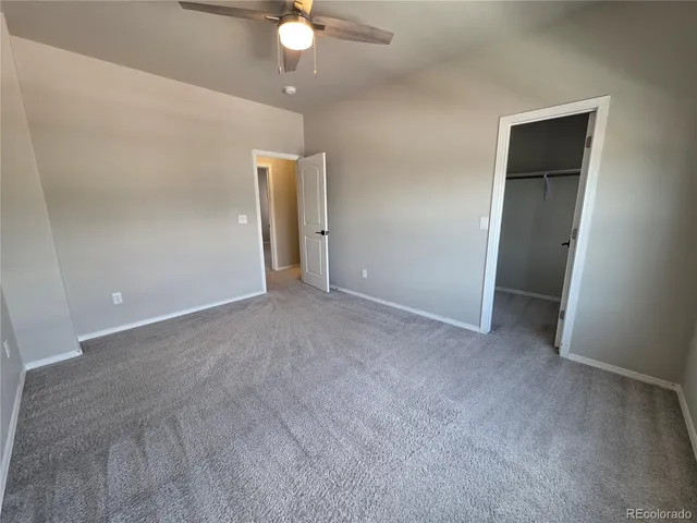 an empty room with fan