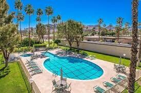 a view of a swimming pool in a yard