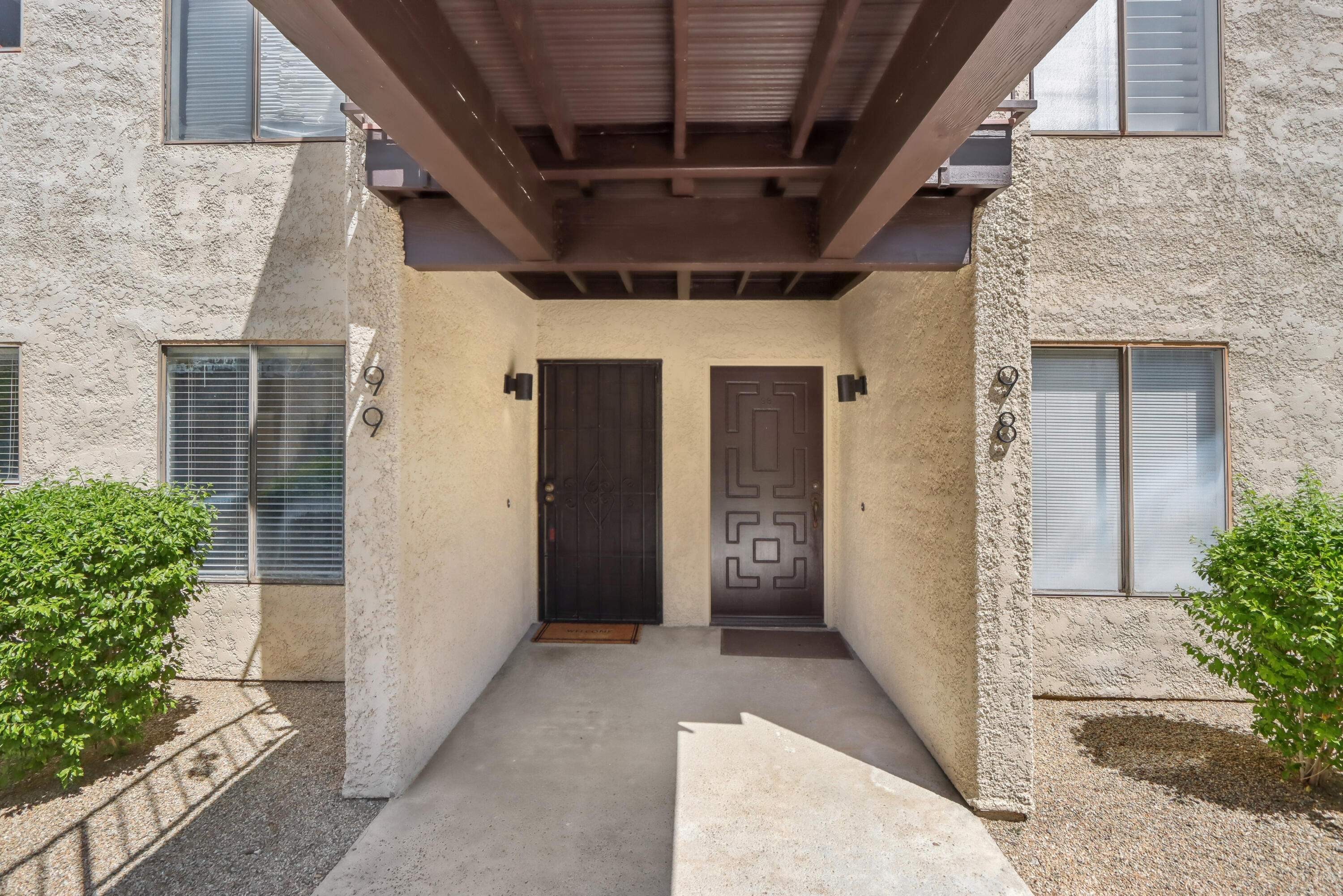 340 East San Jose Road, Unit 99 Palm Springs, CA 92264 - Photo 3 of 26 front view of a house with a porch