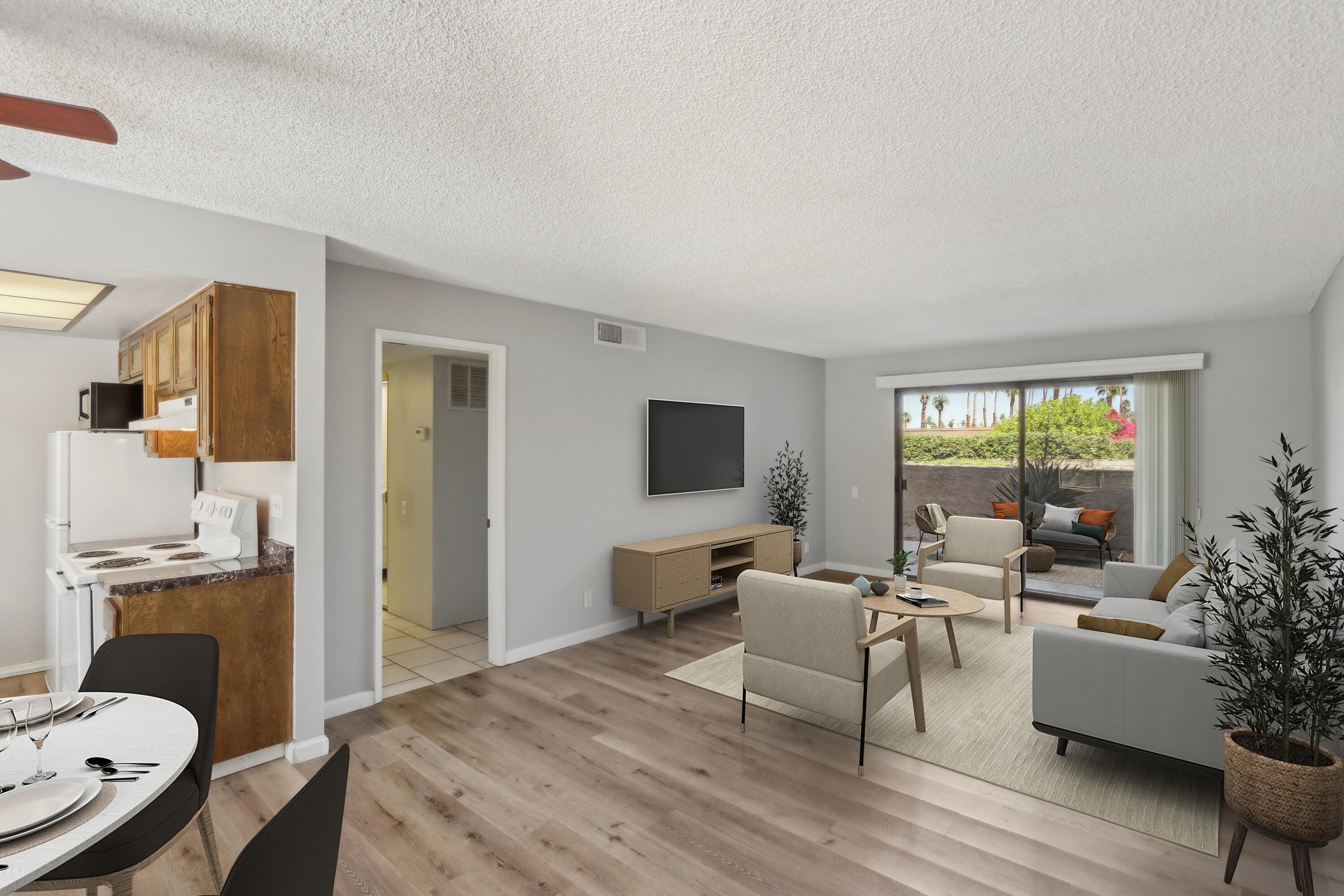 340 East San Jose Road, Unit 99 Palm Springs, CA 92264 - Photo 10 of 26 a living room with furniture or couch and a flat screen tv
