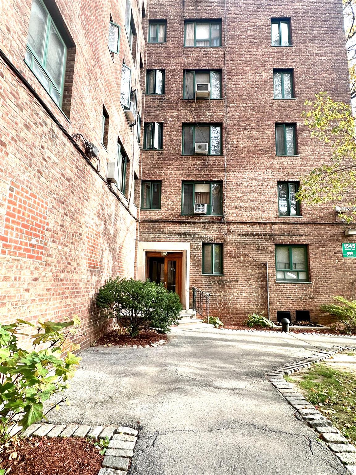 a view of a building with a street