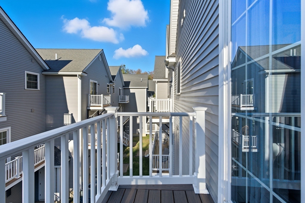 66 Compass Point, Unit 66 North Andover, MA 01845 - Photo 33 of 42 a view of a street with an outdoor space
