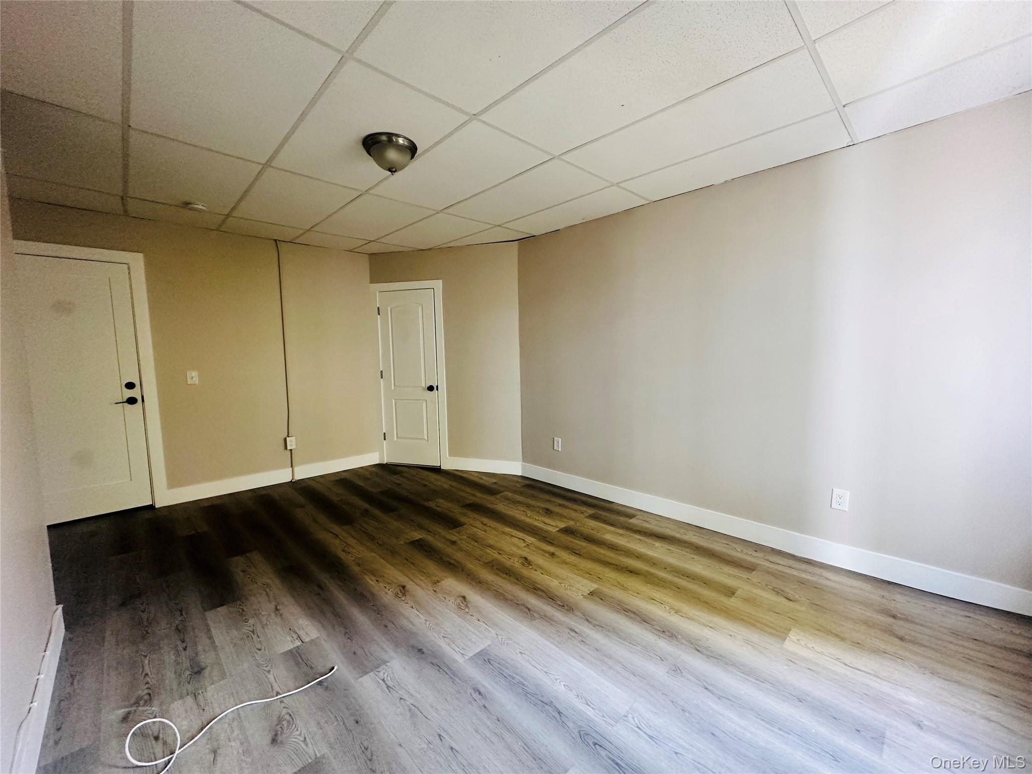 86.5 Garden Street, Unit 2 Poughkeepsie, NY 12601 - Photo 6 of 9 a view of empty room with wooden floor