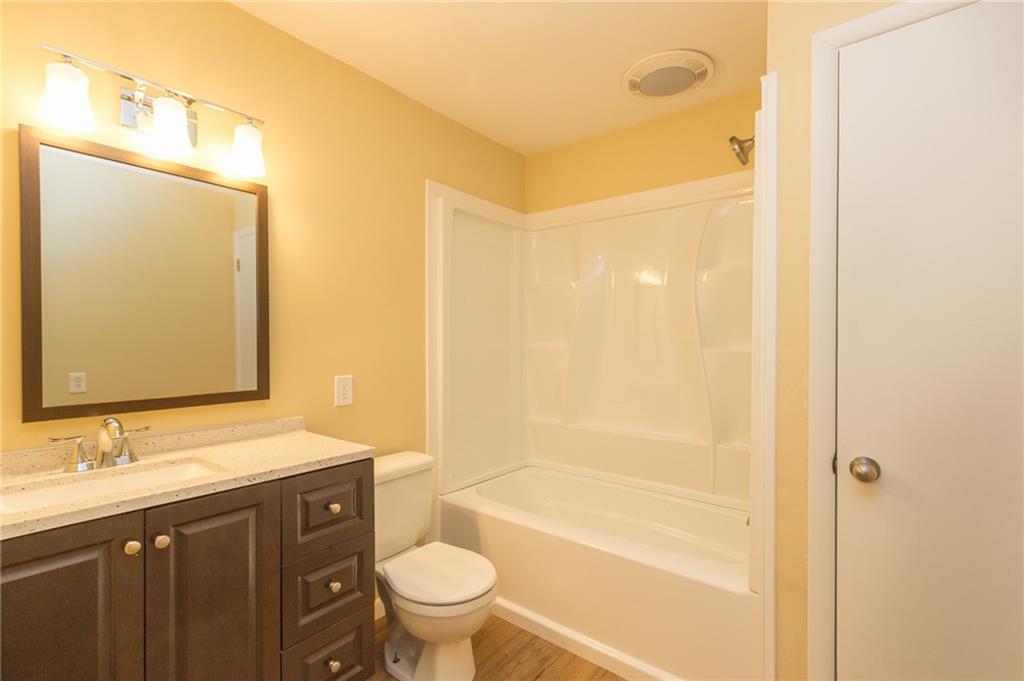 228 Howard Road Sewickley, PA 15143 - Photo 13 of 25 All new full bath on the second floor with gorgeous vanity, large linen closet, new fixtures and hickory flooring.