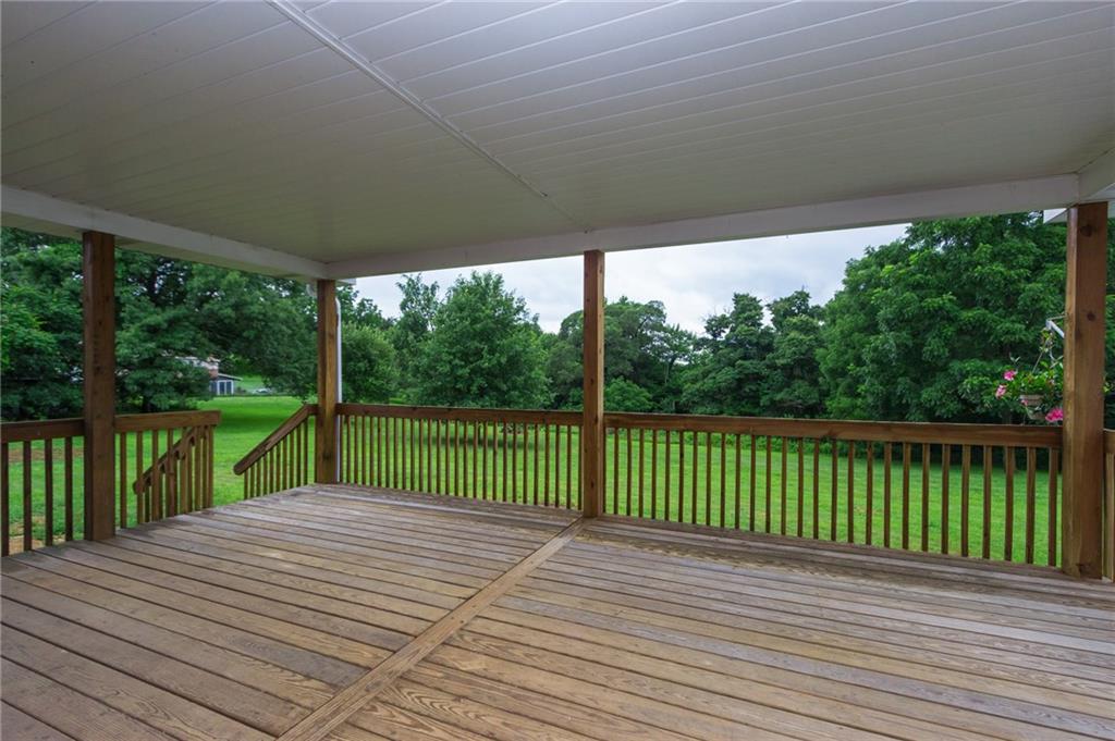 228 Howard Road Sewickley, PA 15143 - Photo 20 of 25 Awesome covered deck overlooking the parklike backyard. Would be a great entertaining space.