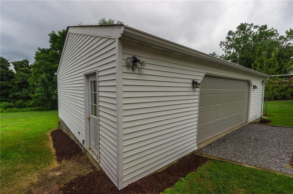 228 Howard Road Sewickley, PA 15143 - Photo 21 of 25 2 car detached garage with new garage doors installed.