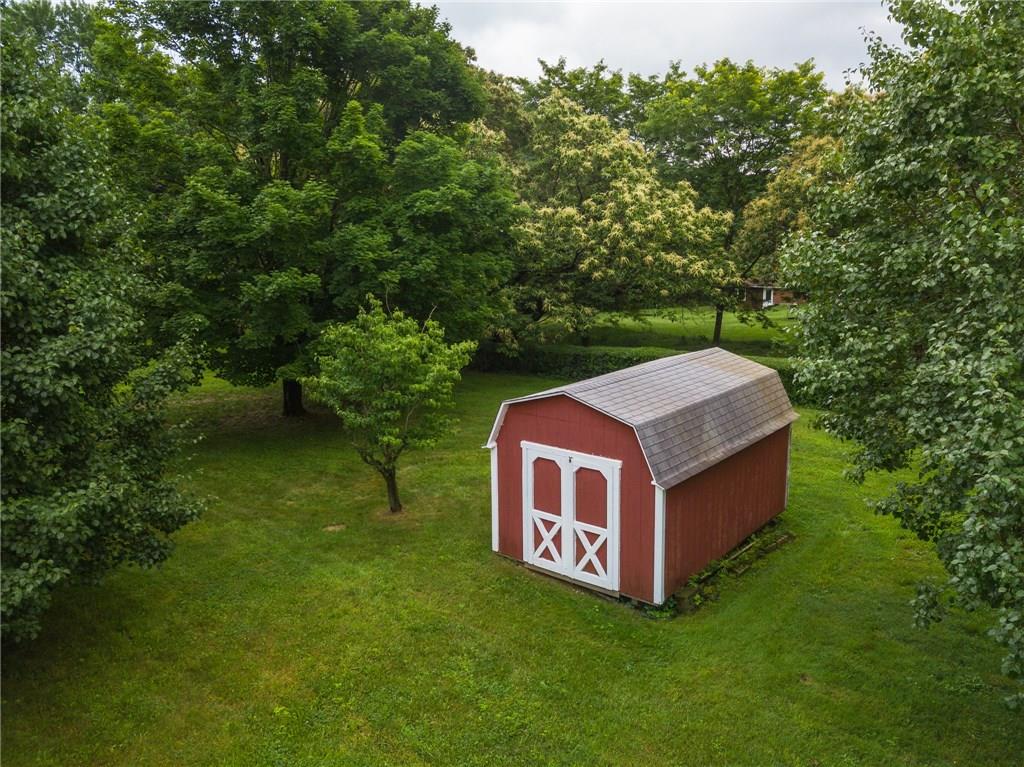 228 Howard Road Sewickley, PA 15143 - Photo 22 of 25 Nice size shed in side yard of the property.