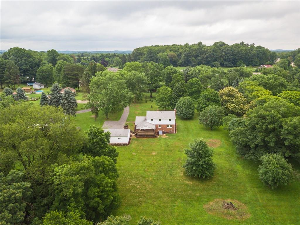 228 Howard Road Sewickley, PA 15143 - Photo 23 of 25 Aerial view of the backyard. 4 acres starting at the top of the driveway and continuing into the woods. This lot is truly a gem.