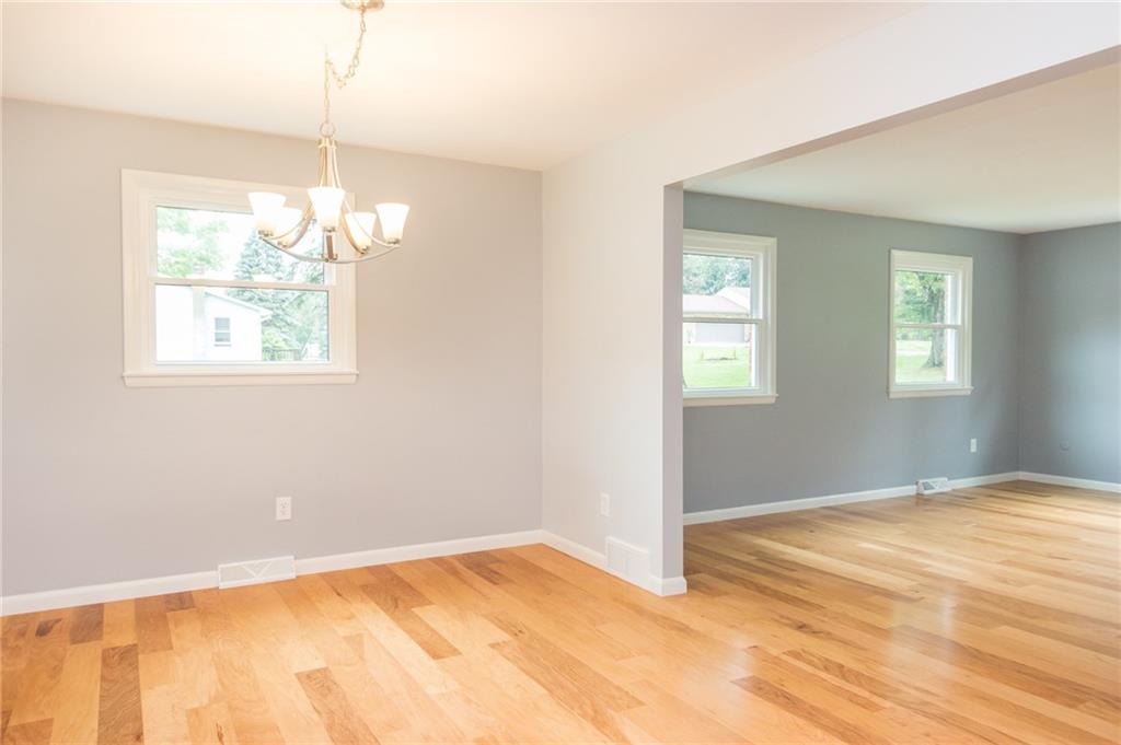 228 Howard Road Sewickley, PA 15143 - Photo 6 of 25 Additional dining area off kitchen. This space has two areas for dining, one open to the formal living room and one open to the family room.
