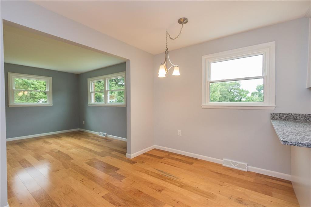 228 Howard Road Sewickley, PA 15143 - Photo 8 of 25 Breakfast nook area with island bar open to the family room.