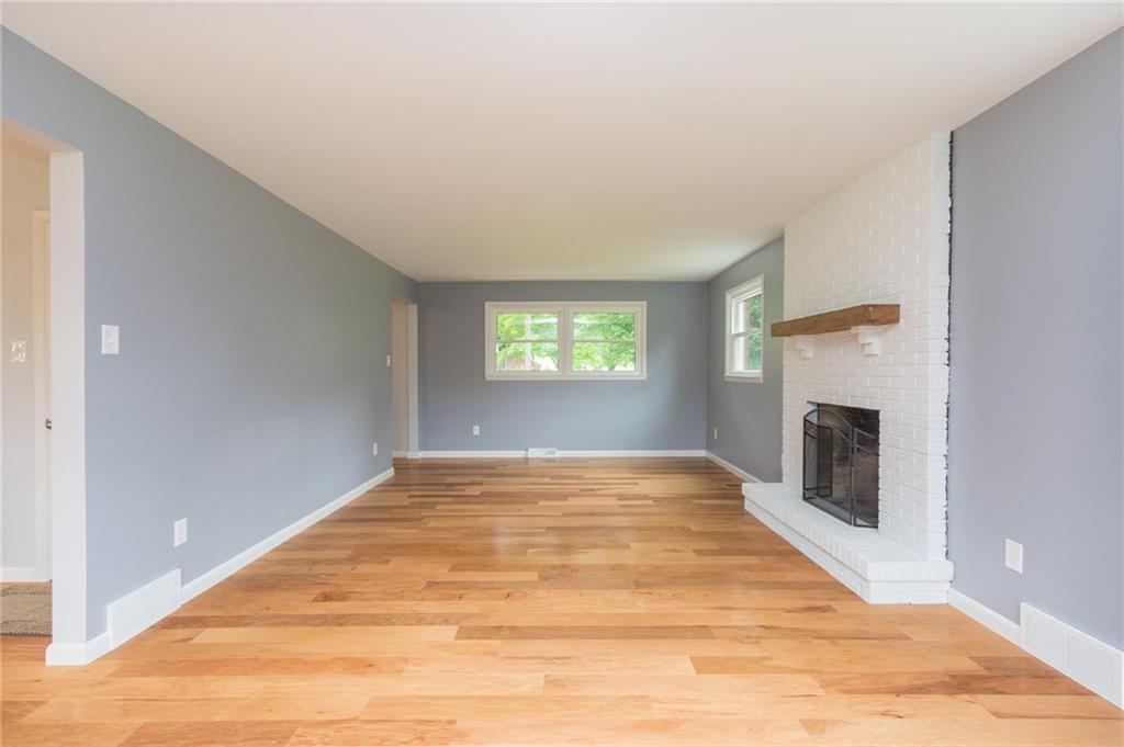 228 Howard Road Sewickley, PA 15143 - Photo 10 of 25 Another angle of the family room which opens to the kitchen and formal entry.
