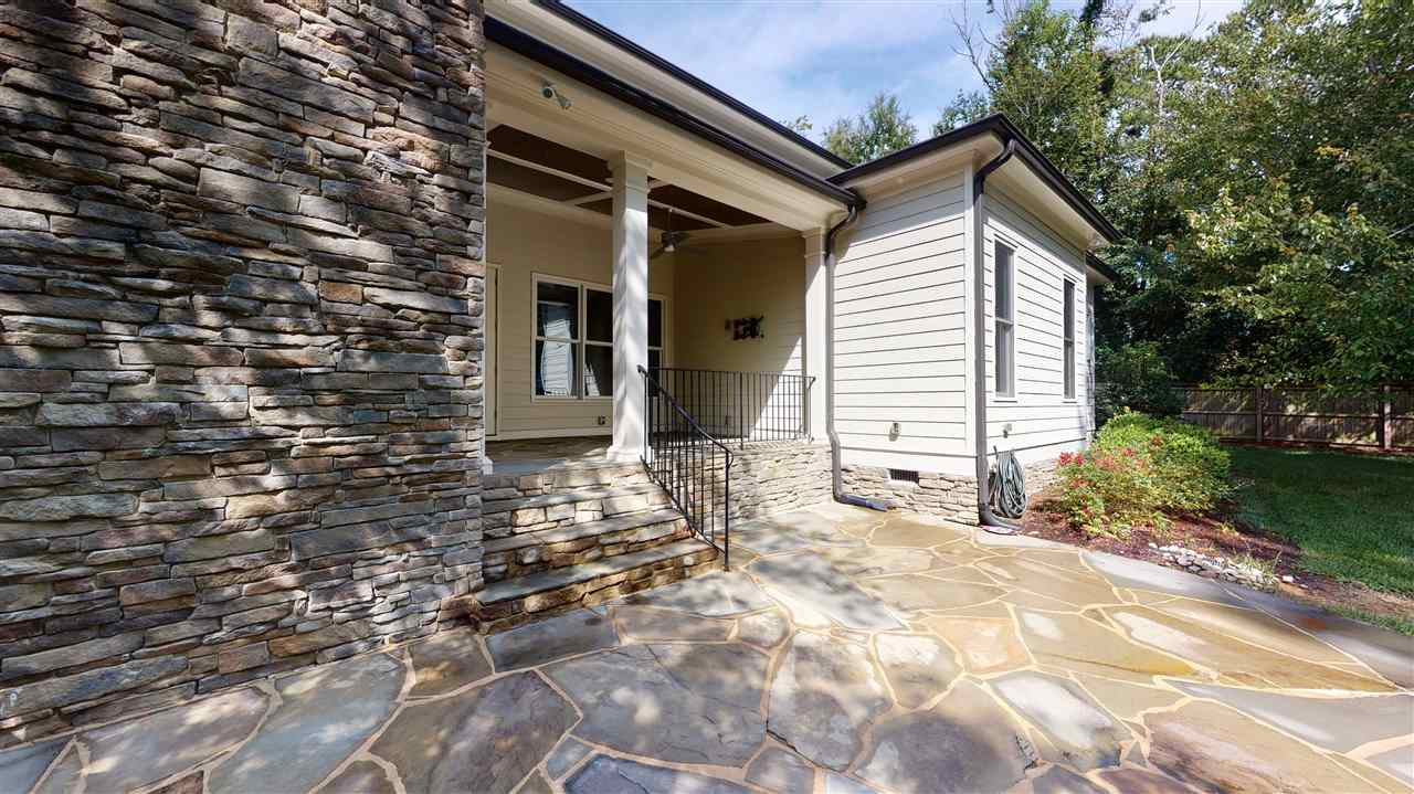 621 Manchester Drive Raleigh, NC 27609 - Photo 23 of 28 Large private, fenced back yard on .43 acre lot. Hook up for natural gas grill Stone Patio
