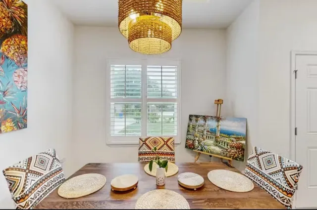 a dining room with wooden floor