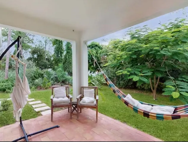 a garden view with a seating space