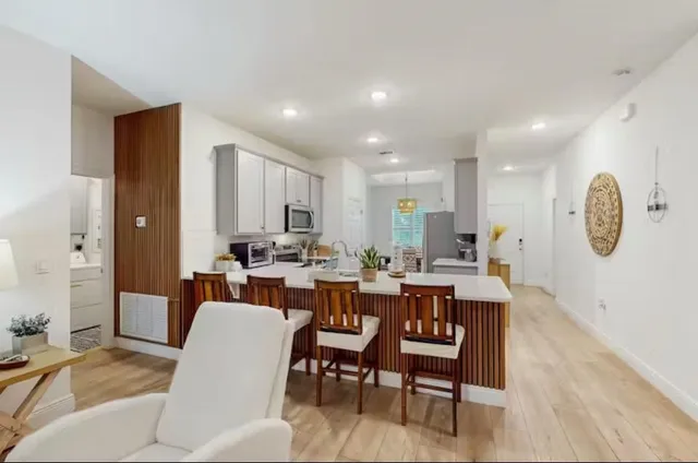 a view of a dining room with furniture