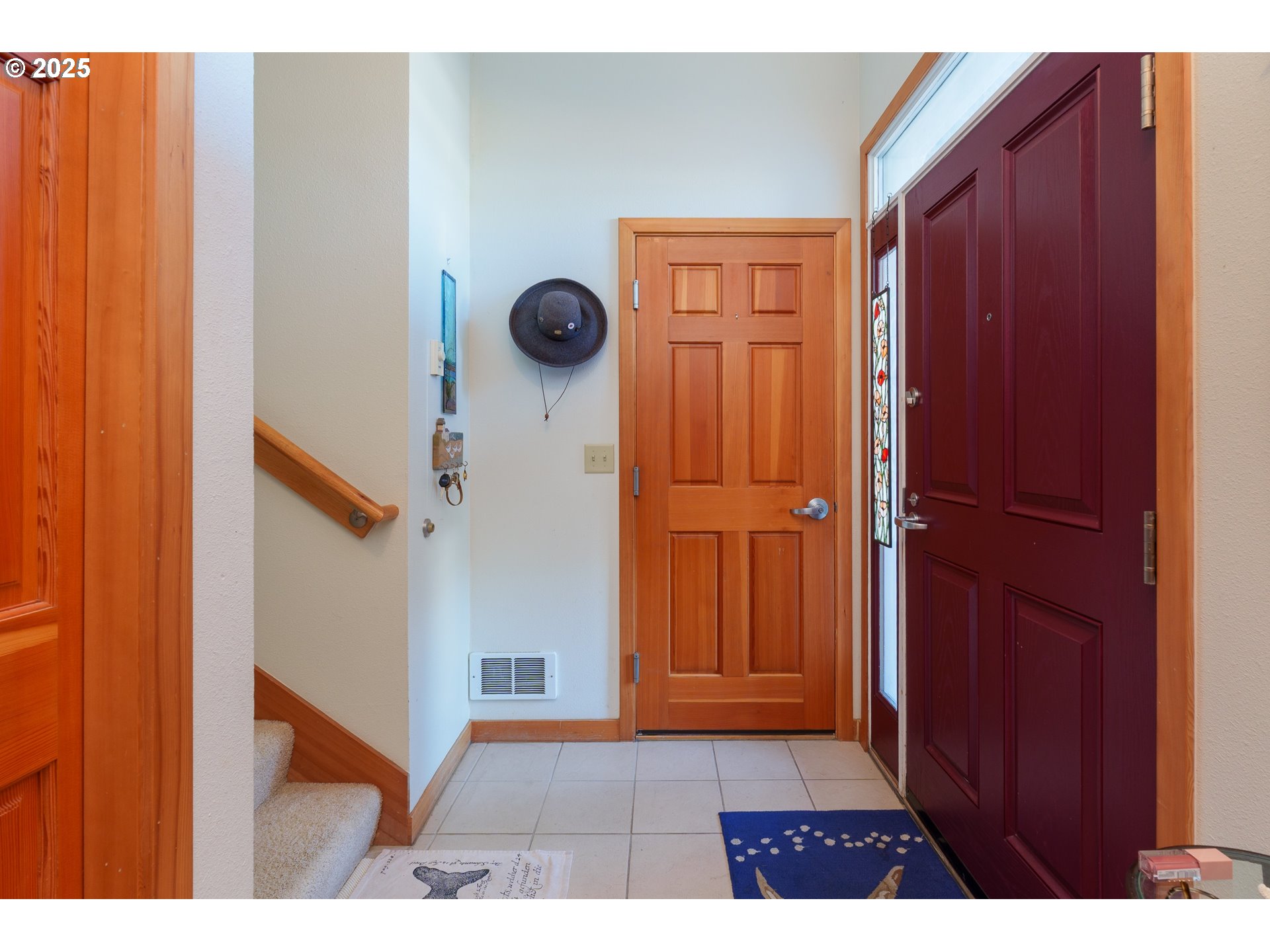 1327 Village Loop Bandon, OR 97411 - Photo 5 of 38 a view of an entryway door