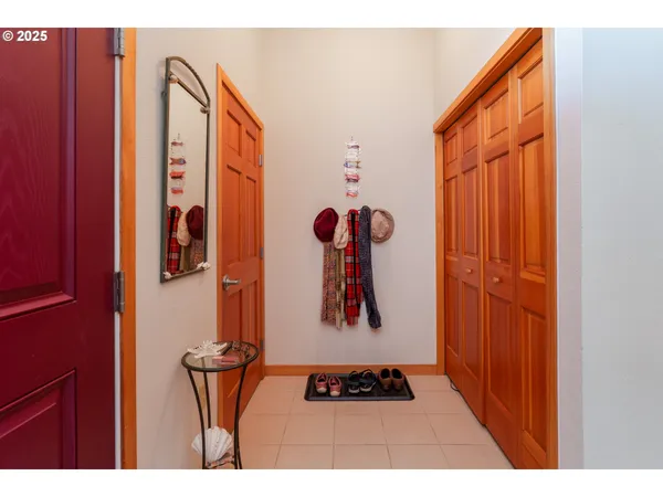 a view of an entryway with wooden floor