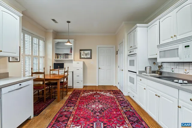 a large kitchen with cabinets