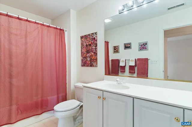 a view of a workspace with furniture and a workspace