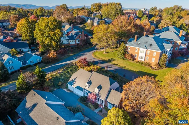 a view of a city with mountains in the background