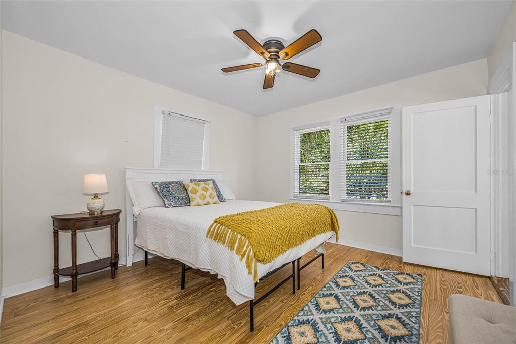 525 Bay Street Dunedin, FL 34698 - Photo 19 of 38 a bedroom with a bed and a window